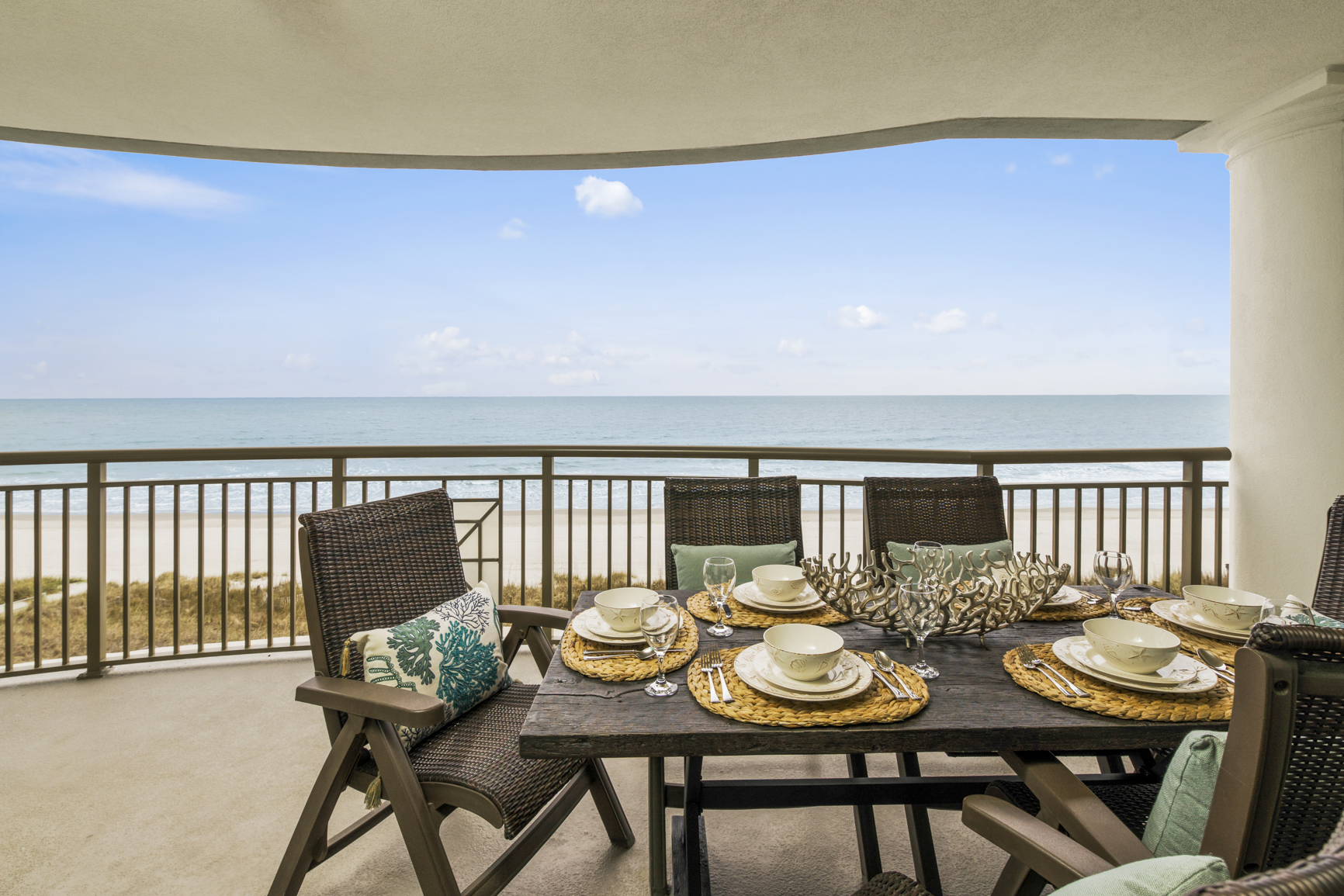 Sandy Pants Balcony Oceanview dining setup on a private condo balcony in North Myrtle Beach during winter.