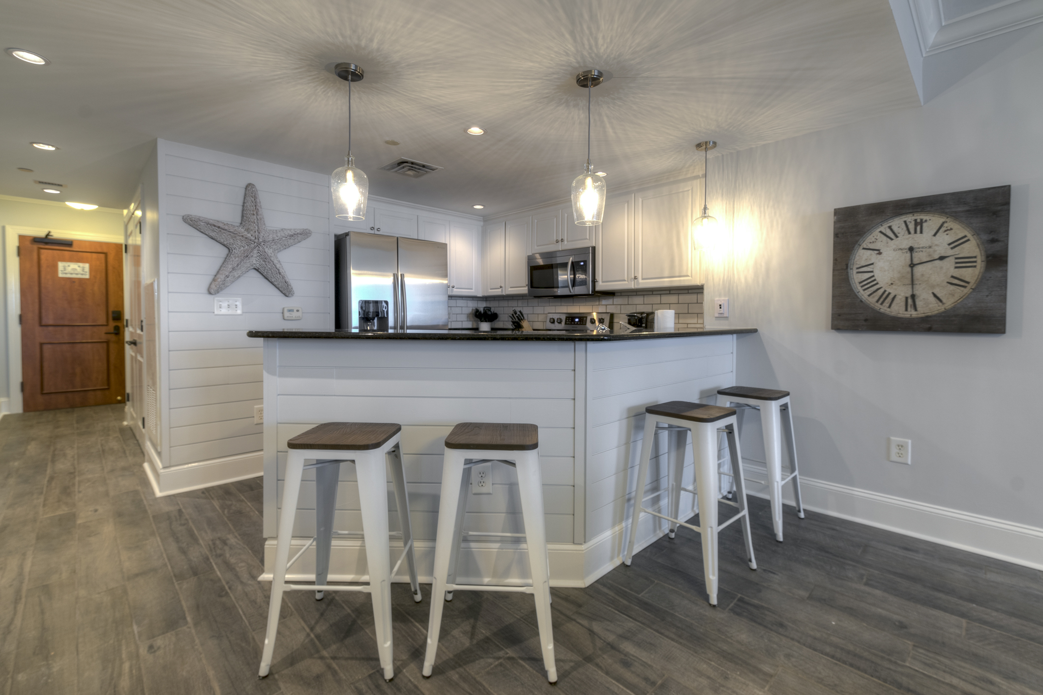 Blue Haven Kitchen Modern coastal kitchen in a beachfront luxury condominium rental.